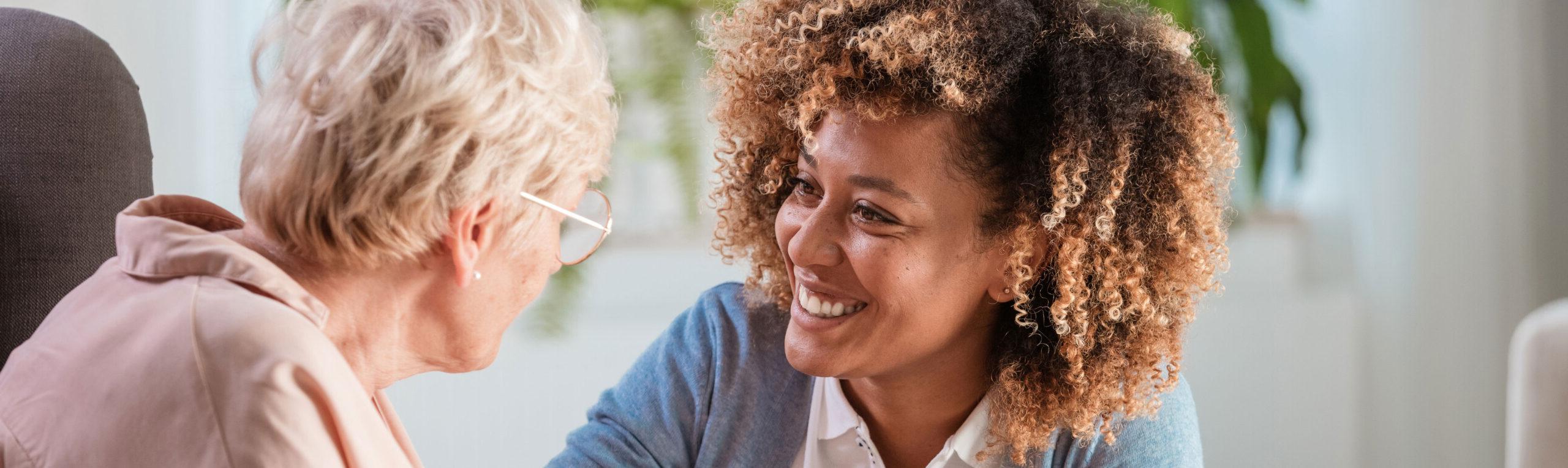 happy social worker with a client